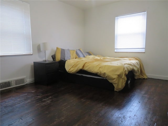 bedroom featuring hardwood / wood-style floors