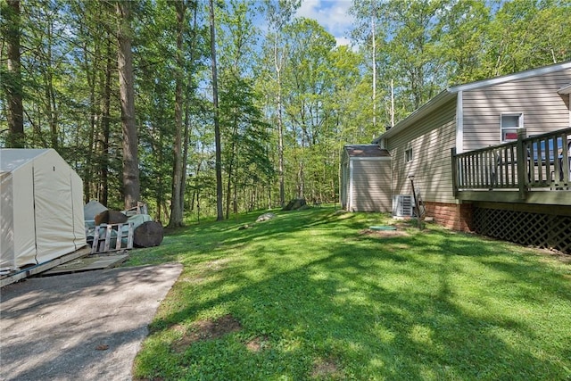 view of yard with a deck