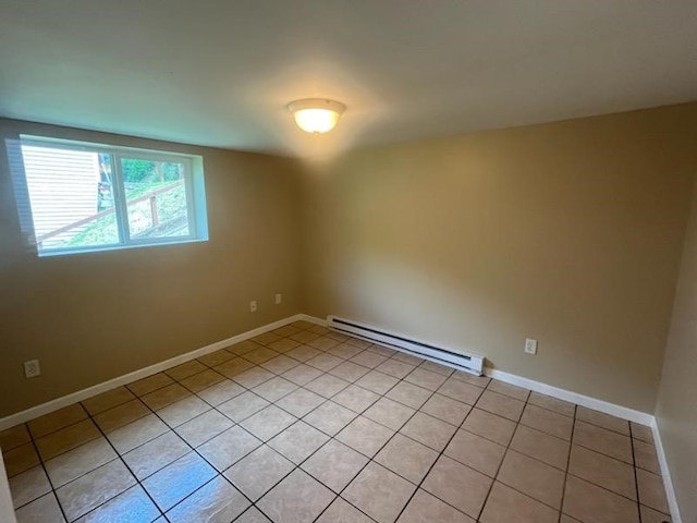 tiled empty room with baseboard heating