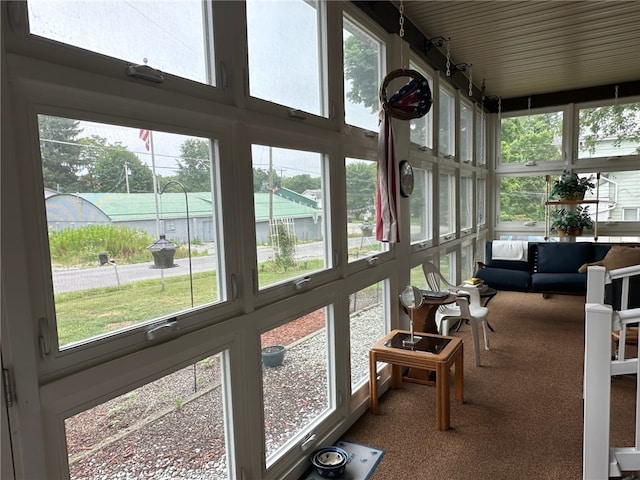 sunroom / solarium featuring plenty of natural light