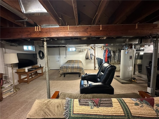 basement featuring carpet and water heater