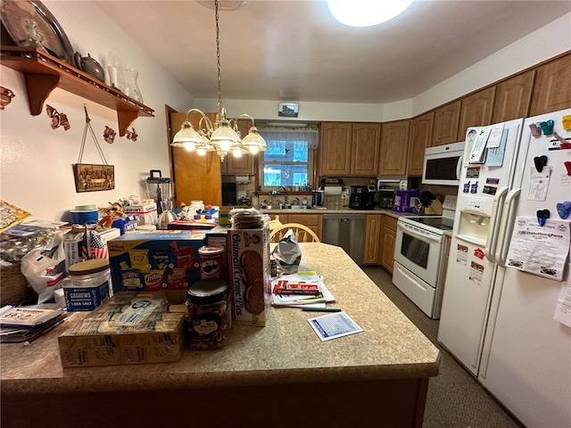 kitchen featuring white appliances, carpet floors, sink, pendant lighting, and a notable chandelier