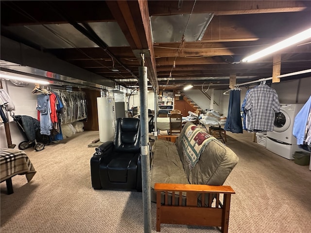 basement featuring carpet floors, washer / dryer, and gas water heater