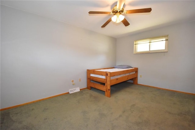 unfurnished bedroom with carpet and ceiling fan