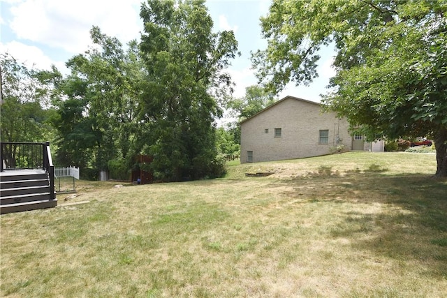 view of yard with a deck