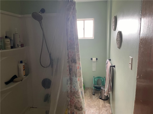 bathroom featuring tile patterned flooring