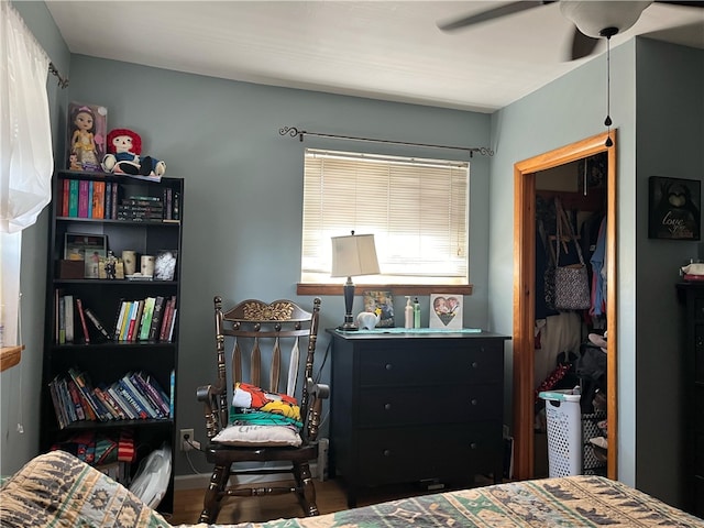 bedroom featuring a closet, ceiling fan, and hardwood / wood-style floors