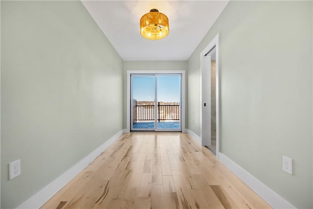 hall featuring light wood-type flooring