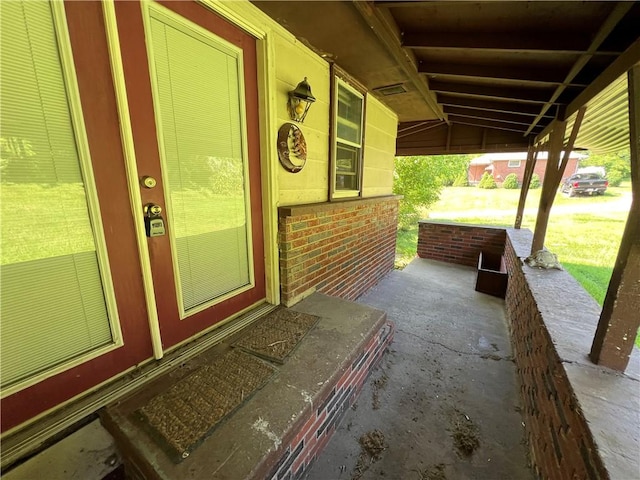 view of patio featuring covered porch