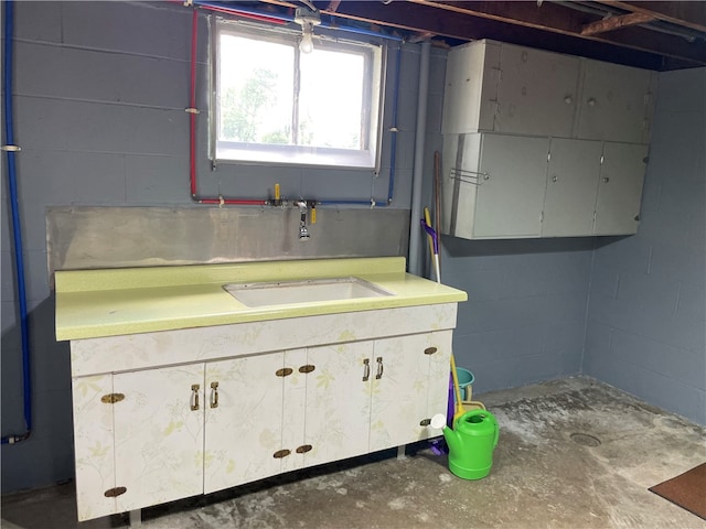 bathroom featuring vanity and concrete floors