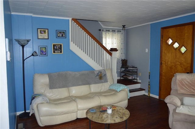 living room with crown molding and dark wood-type flooring