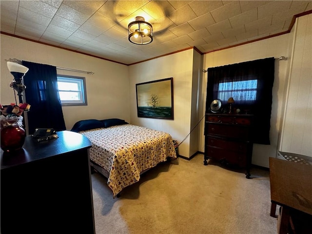 bedroom with carpet floors and crown molding