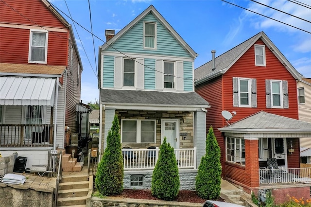 view of property featuring a porch