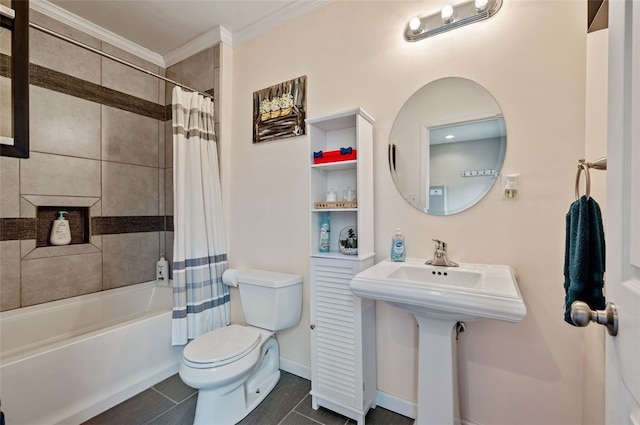 bathroom featuring baseboards, toilet, shower / bath combo, ornamental molding, and a sink