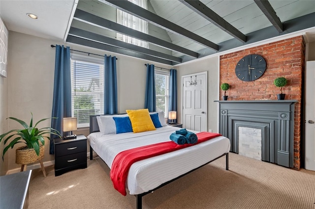 carpeted bedroom with multiple windows, a fireplace, lofted ceiling with beams, and baseboards