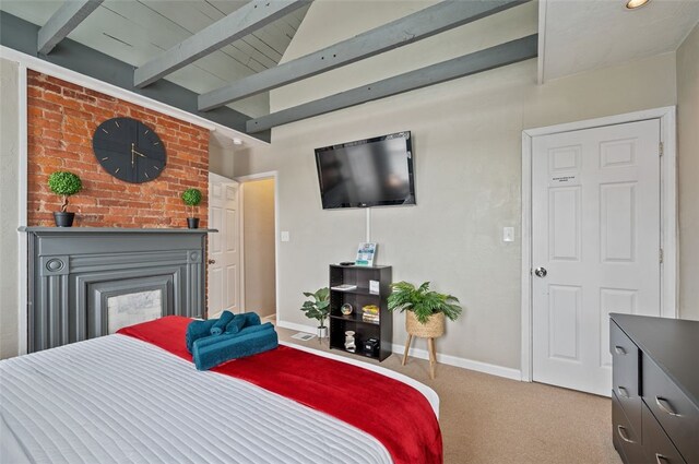 bedroom with baseboards, carpet, and vaulted ceiling with beams