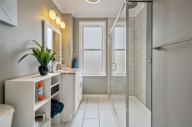 bathroom with tile patterned flooring, a shower stall, toilet, ornamental molding, and vanity