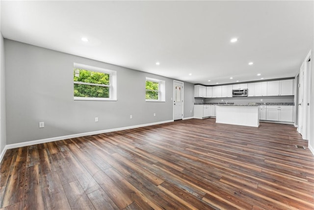 58 Wansack Rd, Shenango Twp Mer, PA 16159 - unfurnished living room featuring dark wood finished floors, recessed lighting, and baseboards
