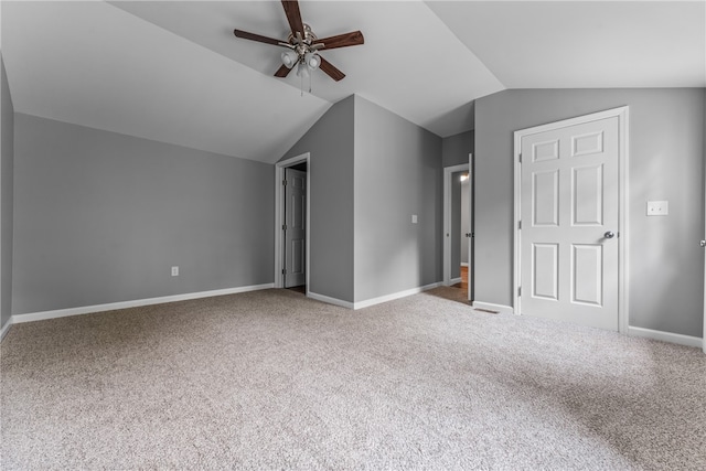 bonus room with carpet floors, ceiling fan, and lofted ceiling