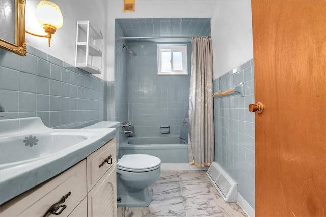 full bathroom featuring vanity, tile walls, shower / bathtub combination with curtain, and toilet