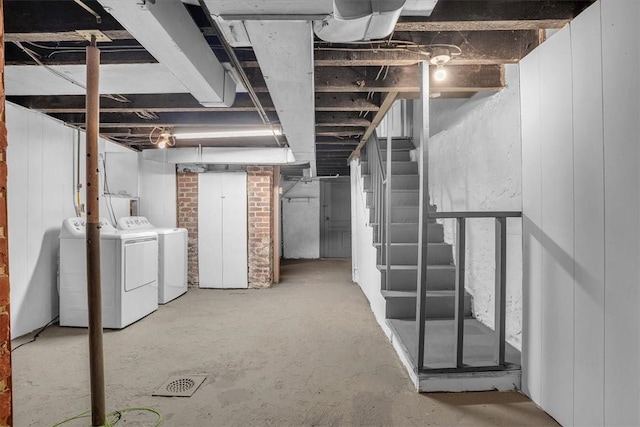 basement with washing machine and dryer