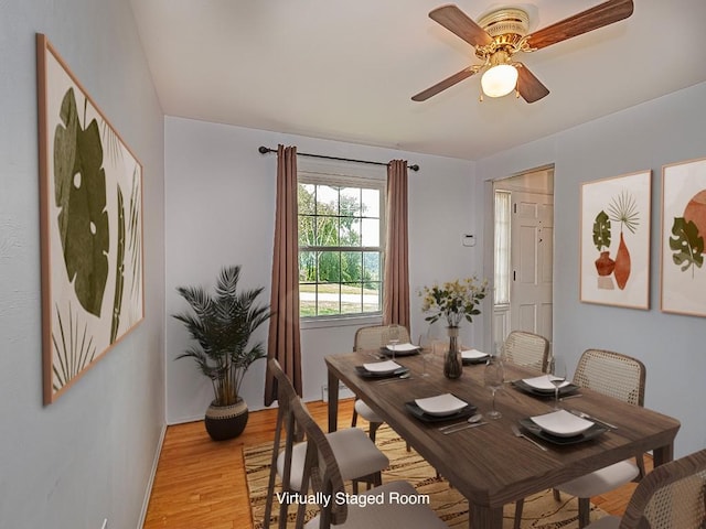 dining area featuring ceiling fan and light hardwood / wood-style flooring