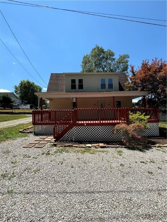 view of front of property with a deck