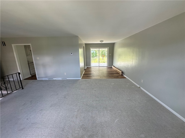 empty room featuring wood-type flooring