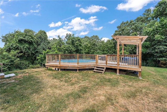 wooden terrace with a yard