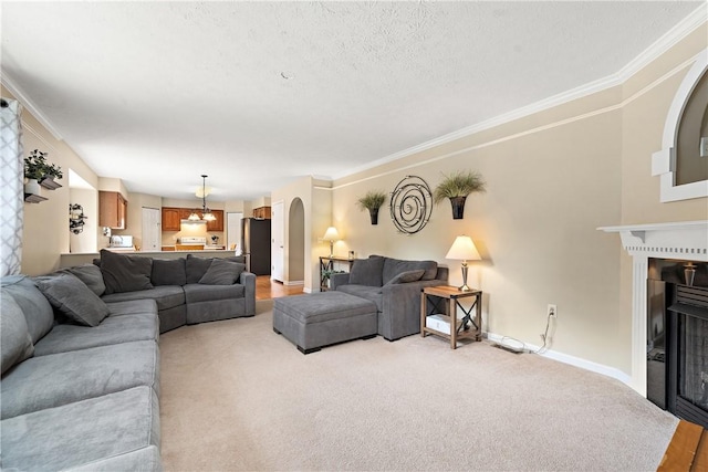 living room featuring crown molding and light carpet