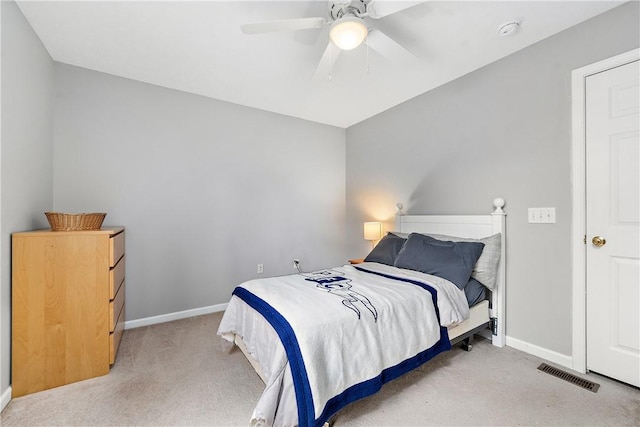 bedroom with light colored carpet and ceiling fan