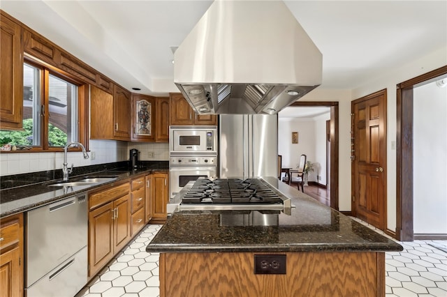 kitchen with a center island, sink, stainless steel appliances, and island range hood