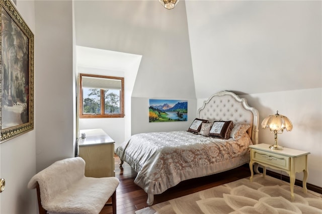 bedroom with hardwood / wood-style floors