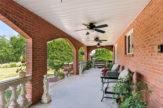 view of patio with covered porch and ceiling fan