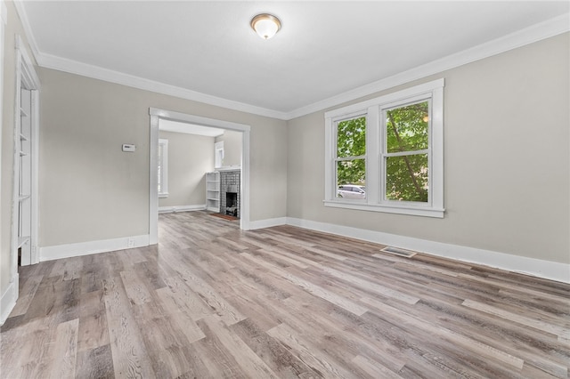 interior space featuring ornamental molding and hardwood / wood-style floors