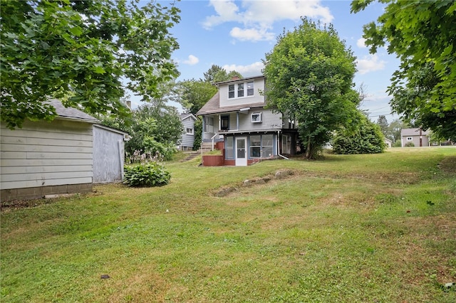 view of yard featuring a sunroom