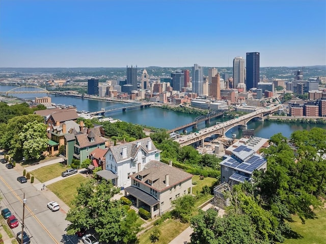 birds eye view of property featuring a water view