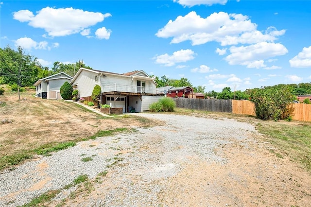 front of property with a wooden deck