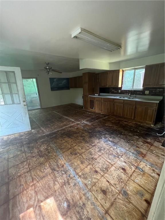 kitchen featuring sink and ceiling fan