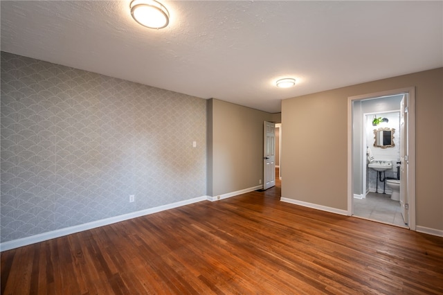 unfurnished room featuring hardwood / wood-style floors