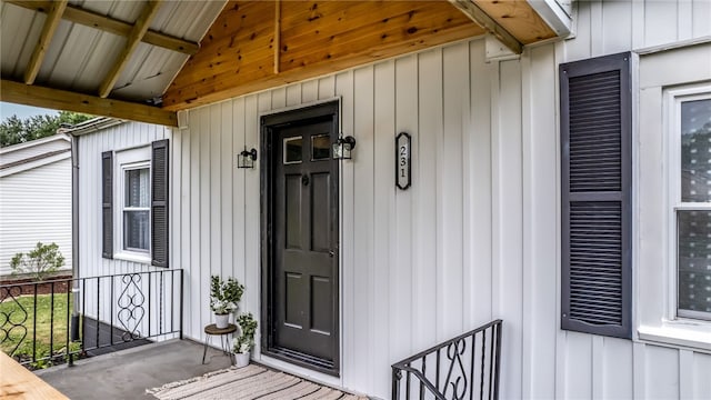 doorway to property with a porch