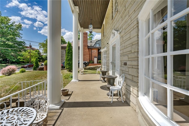 view of patio featuring a porch