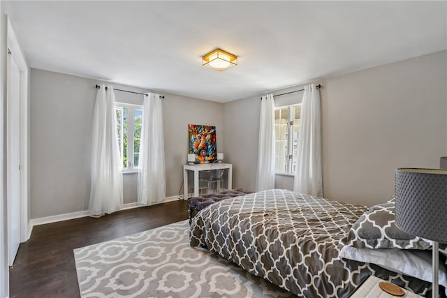 bedroom featuring dark wood-type flooring