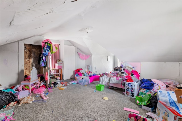 playroom with carpet and vaulted ceiling