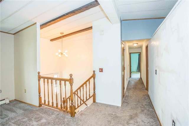 hallway featuring carpet floors, an inviting chandelier, and vaulted ceiling with beams