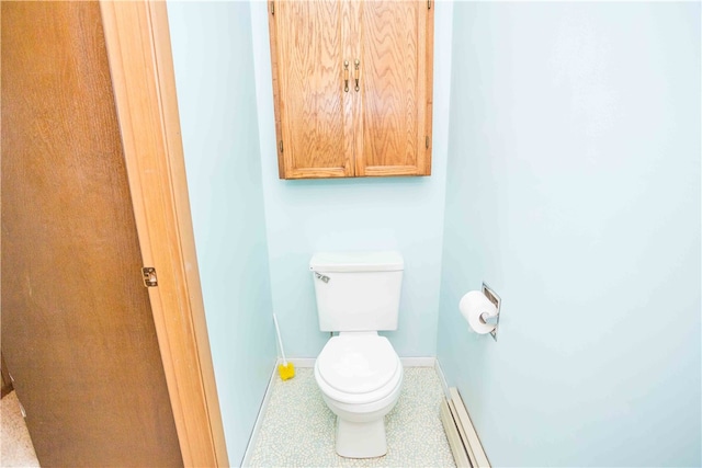 bathroom with tile patterned flooring and toilet