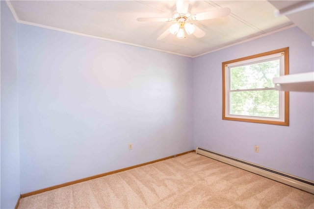 carpeted empty room featuring ornamental molding, a baseboard radiator, and ceiling fan