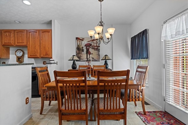 dining room featuring a notable chandelier