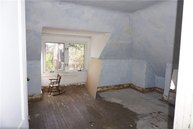 bonus room with hardwood / wood-style floors