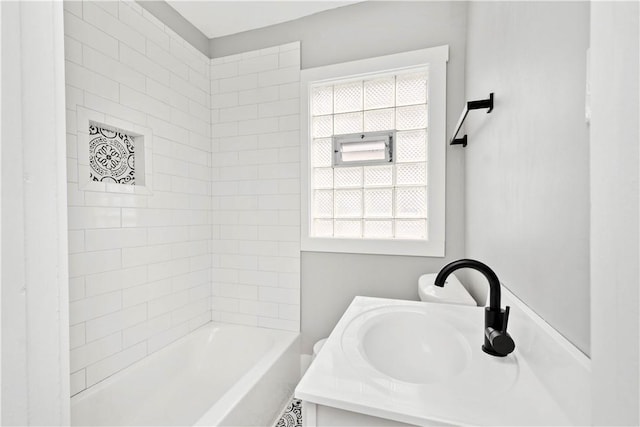 bathroom featuring vanity and shower / bathtub combination